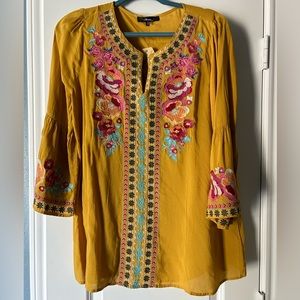 Mustard colored 3/4 length sleeves blouse.